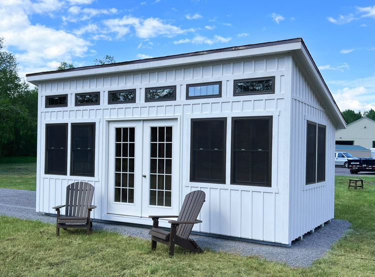 Front view of a White Elite Studio Shed